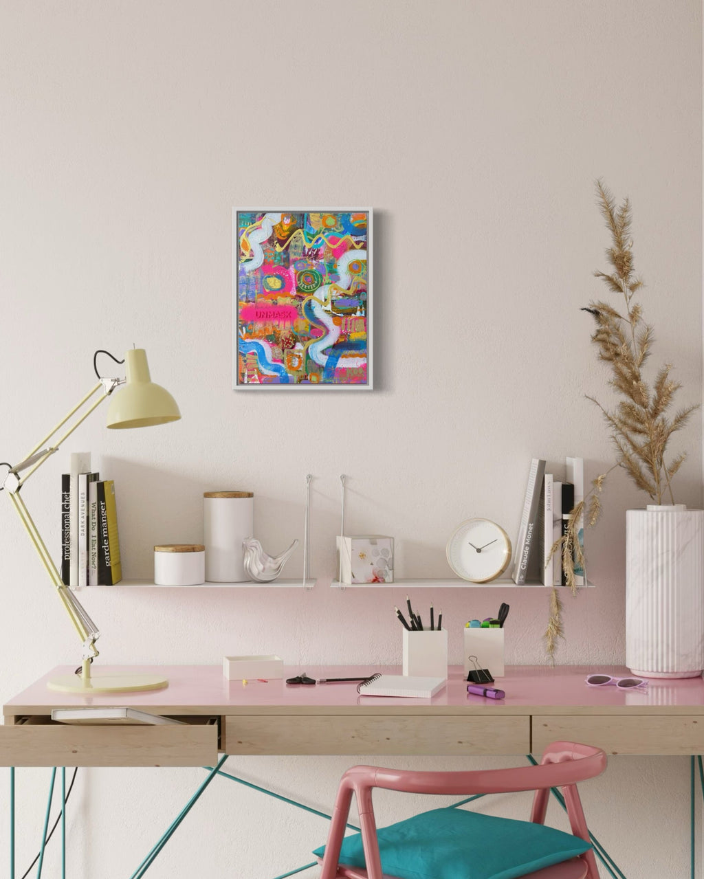 Modern home office with a desk, chair, and decorative items.